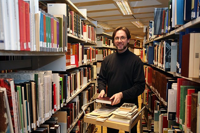 Ian Watson in library