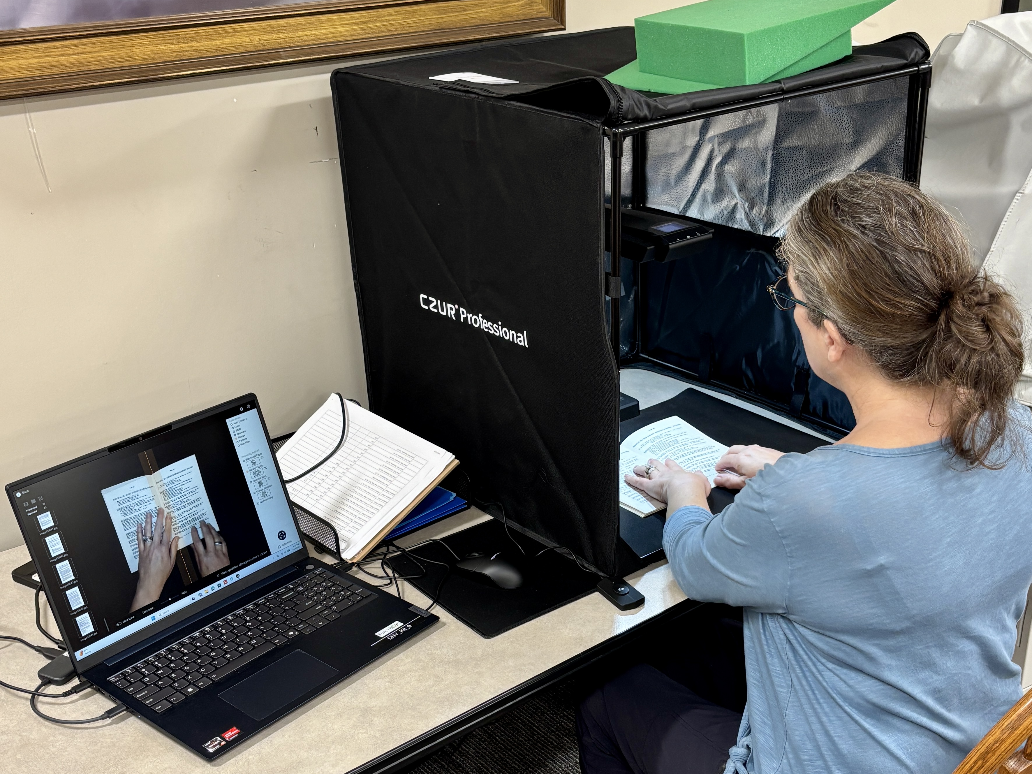 Volunteer and NYG&B member Hope Scott-Stier digitizes materials from the Haviland-Heidgerd Historical Collection at the Elting Memorial Library.